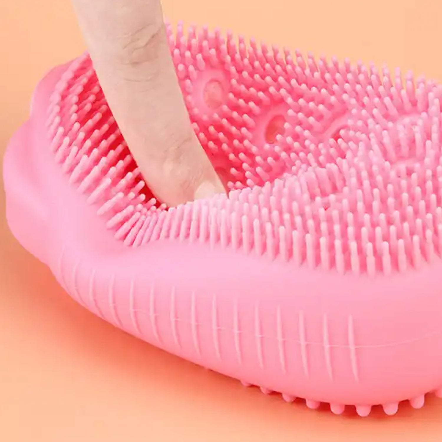 Super soft silicone scrubber brush with ergonomic design for comfortable use. Super soft silicone scrubber brush with ergonomic design for comfortable use.